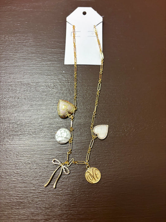 gold dipped heart and ribbon necklace