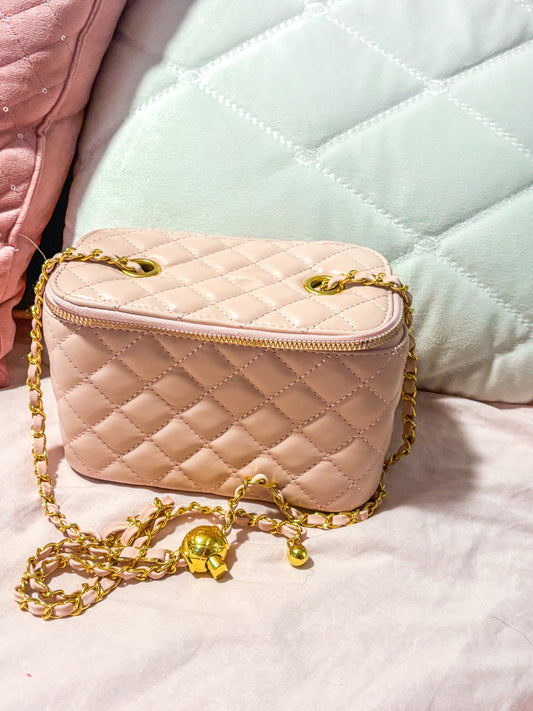 Pink quilted purse